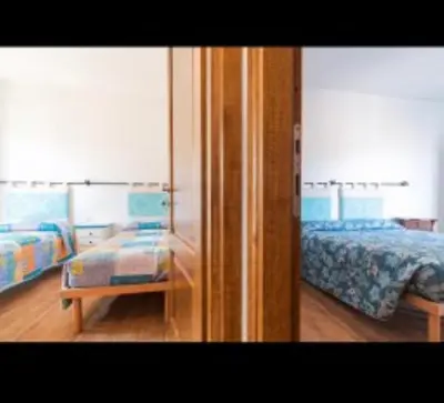 Letto o letti in una camera di Casa Nicola