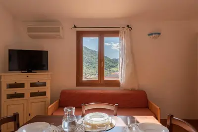 TV o dispositivi per l'intrattenimento presso Crystal Pool Village In Tanaunella