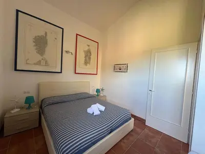 Letto o letti in una camera di AffittaSardegna- Casa Costa