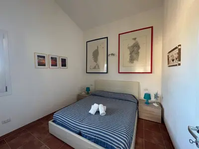 Letto o letti in una camera di AffittaSardegna- Casa Costa