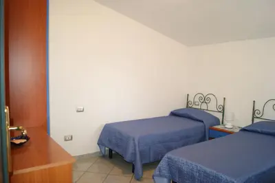 Letto o letti in una camera di AME house two