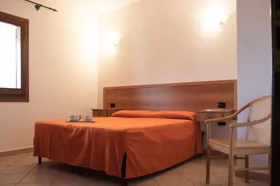 Letto o letti in una camera di Violet Residence In Orosei