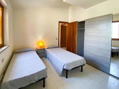 Letto o letti in una camera di Le Residenze Bonsai