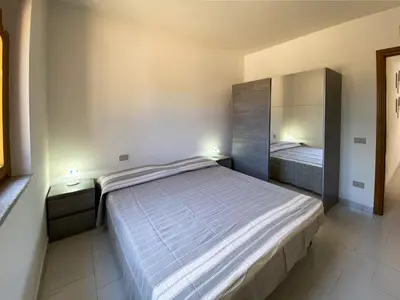 Letto o letti in una camera di Le Residenze Bonsai