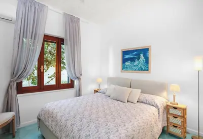 Letto o letti in una camera di Villa Libeccio Sul Mar