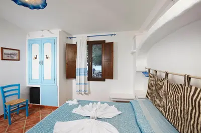 Letto o letti in una camera di Agriturismo Codula Fuili