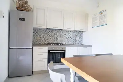 Cucina o angolo cottura di La Cinta Apartments