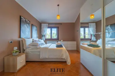 Letto o letti in una camera di Lussuosa Villa con piscina a Porto Rotondo