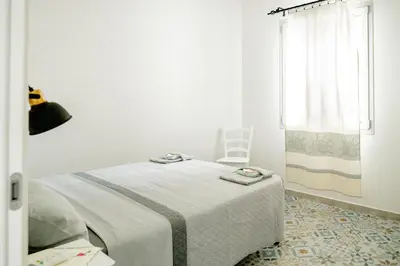 Letto o letti in una camera di Orosei365