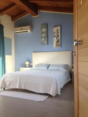 Letto o letti in una camera di Mediterraneo
