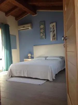 Letto o letti in una camera di Mediterraneo
