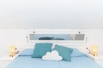 Letto o letti in una camera di Vista Golfo 1