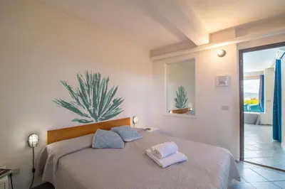 Letto o letti in una camera di Vista Golfo 4