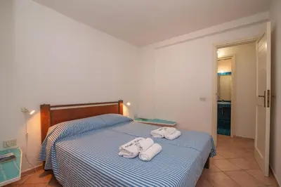 Letto o letti in una camera di Vista Tavolara 1