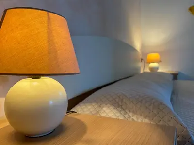 Letto o letti in una camera di Casa Marika