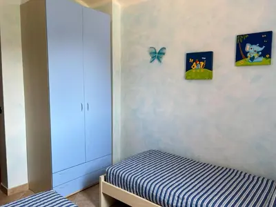 Letto o letti in una camera di Casa Marika