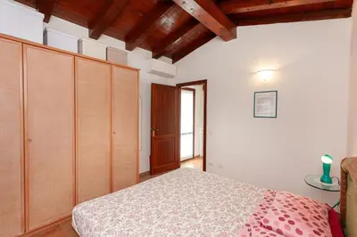 Letto o letti in una camera di Villetta Perla Marina