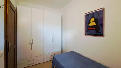 Letto o letti in una camera di DaDa House Trilocale La Suaredda di Supra San Teodoro