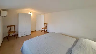 Letto o letti in una camera di DaDa House Trilocale La Suaredda di Supra San Teodoro