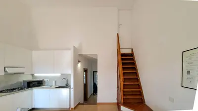 Cucina o angolo cottura di DaDa House Trilocale La Suaredda di Supra San Teodoro