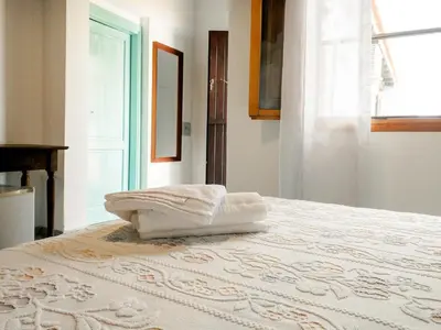 Letto o letti in una camera di Agriturismo Guparza