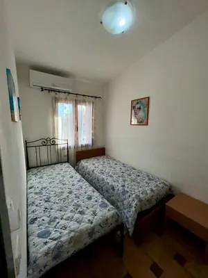 Letto o letti in una camera di Grazioso trilocale a Porto Ottiolu