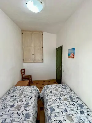 Letto o letti in una camera di Grazioso trilocale a Porto Ottiolu