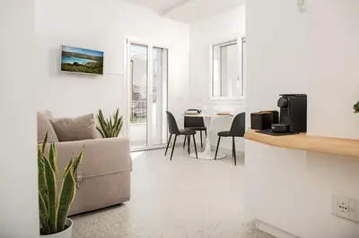 Area soggiorno di Madau's House Exclusive Apartments & Suites
