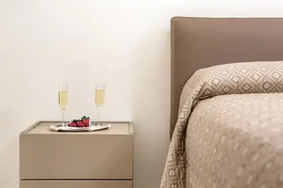 Letto o letti in una camera di Madau's House Exclusive Apartments & Suites