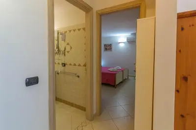 Letto o letti in una camera di Pittulongu mare