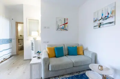 Area soggiorno di AD Veronese Apartment