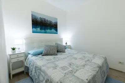 Letto o letti in una camera di AD Veronese Apartment