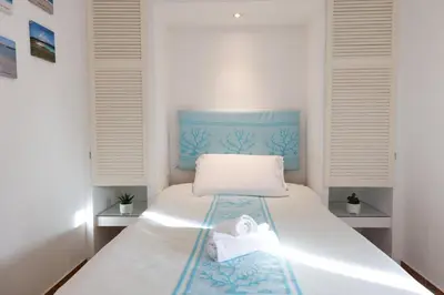 Letto o letti in una camera di AD Suite Ventimiglia