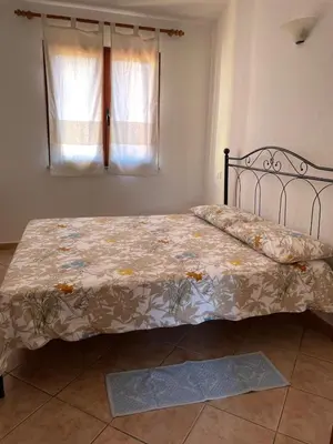 Letto o letti in una camera di Sa Costa