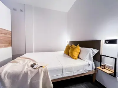 Letto o letti in una camera di Mono Tavolara
