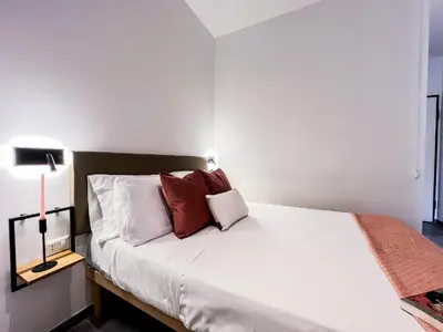 Letto o letti in una camera di Mono Molara