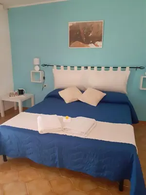 Letto o letti in una camera di Agriturismo Pira Pinta