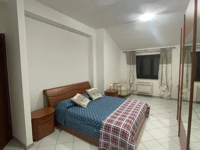 Letto o letti in una camera di Appartamento in centro