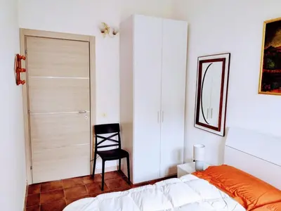 Letto o letti in una camera di Casa Marisa