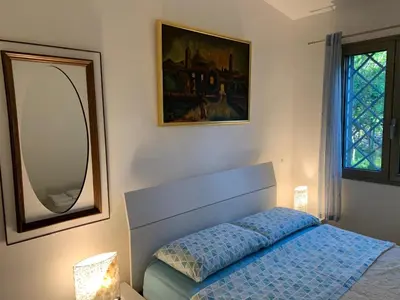 Letto o letti in una camera di Casa Marisa