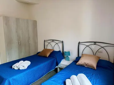 Letto o letti in una camera di CASA SAS ENAS trilocale indipendente -Ammentos Posada -