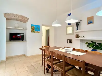 TV o dispositivi per l'intrattenimento presso Le Residenze dei Mandorli - Appartamenti immersi nel verde della macchia mediterranea a Orosei
