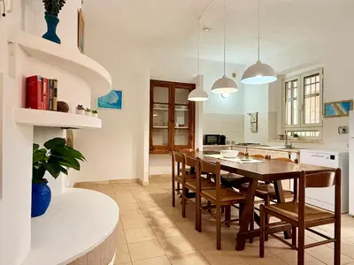 Cucina o angolo cottura di Le Residenze dei Mandorli - Appartamenti immersi nel verde della macchia mediterranea a Orosei