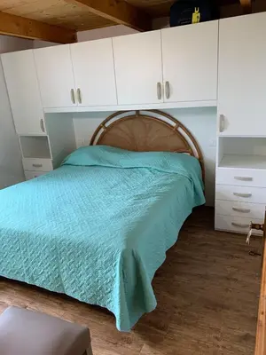 Letto o letti in una camera di C17 Villaggio Asfodeli