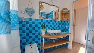 Bagno di Harry's House San Teodoro con piscina privata