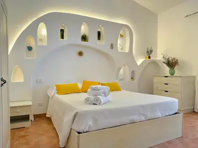 Letto o letti in una camera di Green Hotel 