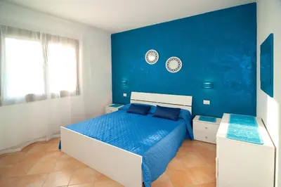 Letto o letti in una camera di Appartamento vicino alla spiaggia -B-