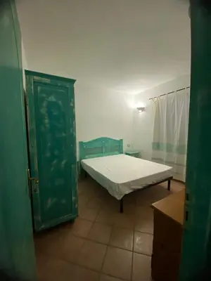 Letto o letti in una camera di Case vacanza Pittulongu