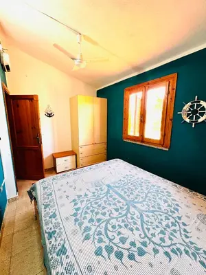 Letto o letti in una camera di Appartamento San Teodoro III