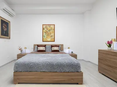 Letto o letti in una camera di Apartment Domus Flavia by Interhome